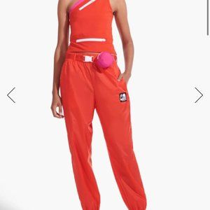 NB X STAUD NEW BALANCE SLEEK FIREY TOP AND TRACK PANTS